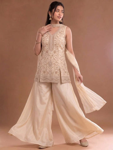 White Embroidered Kurta Set Featuring Zari And Sequin Work With A Matching Flared Palazzo And Embellished Dupatta