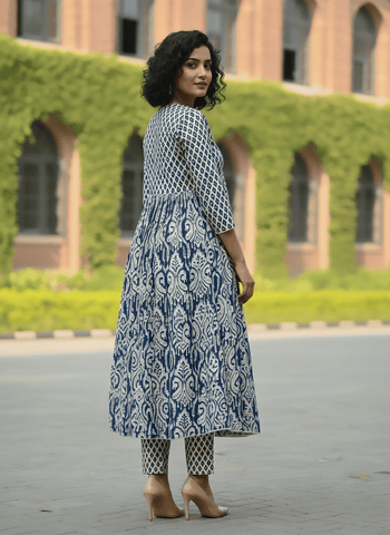 Classic ikat print Aliya-cut kurta in blue and white, teamed with regular-fit ankle-length trousers.