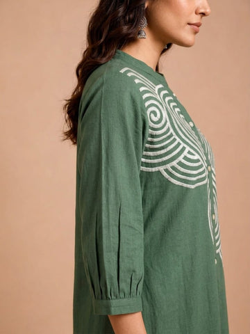 Green Embroidered Dress Featuring Bold Spiral Thread Work