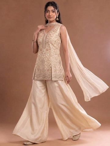 White Embroidered Kurta Set Featuring Zari And Sequin Work With A Matching Flared Palazzo And Embellished Dupatta