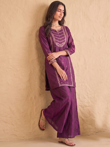 Wine Embroidered Kurta Set Paired With A Shimmering Organza Dupatta.