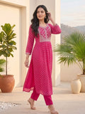 Bandhani-Printed Fuchsia Anarkali With Zari-Embroidered Yoke, Paired With Solid Trousers And Dupatta .