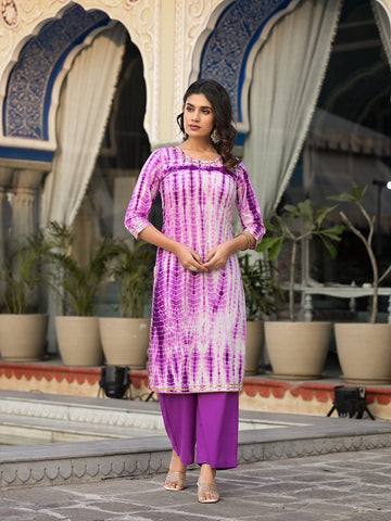 Varanga straight kurta with round neck paired with blue solid palazzo and blue solid dupatta.