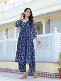 Varanga Women Navy Blue All over Floral Printed Pleated Empire Kurta Paired With Tonal Bottom