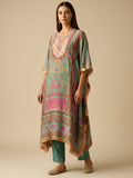 Kaftan-Style Kurta With A V-Neck, Paired With Solid Ankle-Length Trousers For A Relaxed Yet Elegant Look.