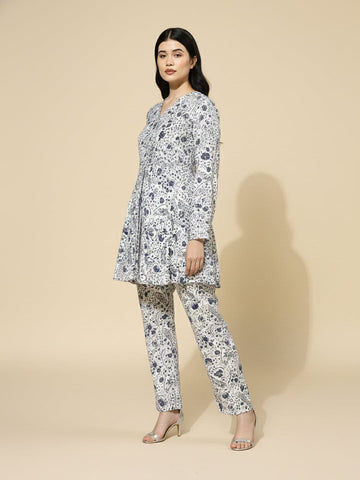 KSUT Women white floral printed top paired with tonal  printed bottom