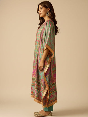 Kaftan-Style Kurta With A V-Neck, Paired With Solid Ankle-Length Trousers For A Relaxed Yet Elegant Look.