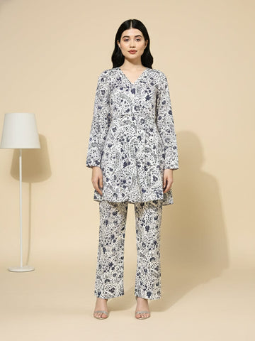 KSUT Women white floral printed top paired with tonal  printed bottom