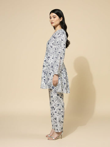 KSUT Women white floral printed top paired with tonal printed bottom