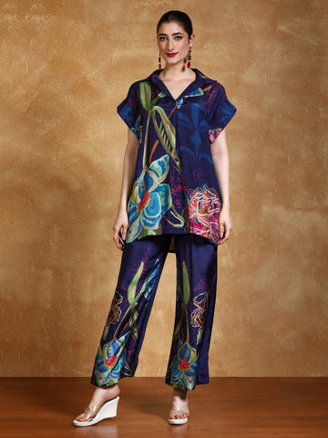 Bold floral printed loose fit top with flared palazzo