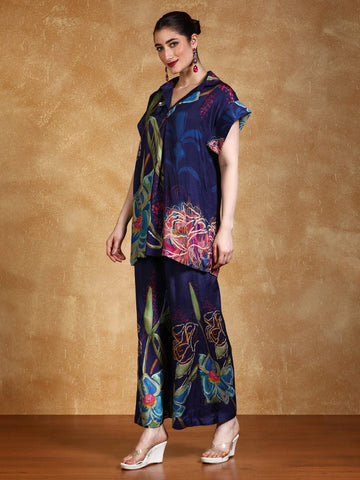 Bold floral printed loose fit top with flared palazzo