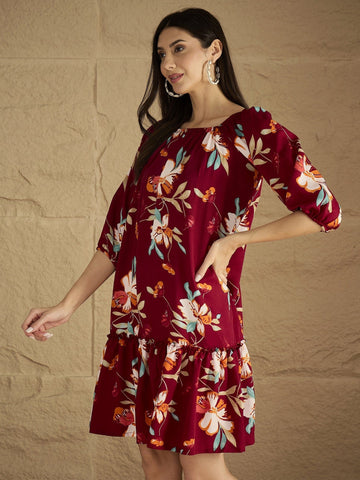 A Bold Floral-Printed Knee-Length Dress With An Elasticated Off-Shoulder Neckline And Balloon Sleevesâ€”Perfect For Turning Heads From Brunch To Evening Outings.