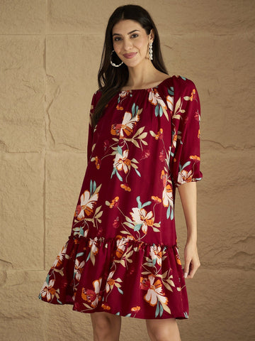 A Bold Floral-Printed Knee-Length Dress With An Elasticated Off-Shoulder Neckline And Balloon Sleeves Perfect For Turning Heads From Brunch To Evening Outings.