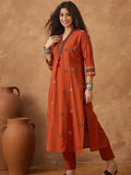 Thread embroidered panelled kurta paired with a pair solid trousers