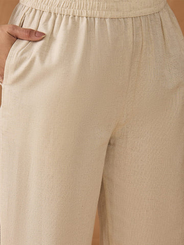 Flamingo embroidered kurta paired with solid trousers