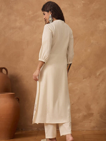 Flamingo embroidered kurta paired with solid trousers
