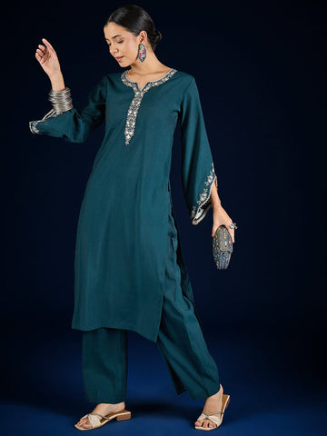 Varanga Solid Kurta With Zari Embroidery Yoke Paired With Trousers For A Refined Ethnic Look.