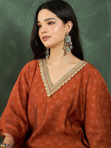 Varanga Rust Mughal-Printed Straight-Fit Kurta With Lace Detailing, Paired With Solid Ankle-Length Divider Pants For A Stylish Ethnic Look.