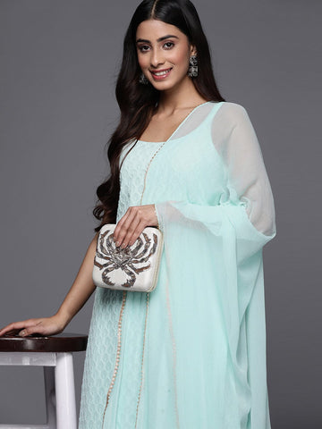 Varanga light blue spaghetti strap kurta with bottom and dupatta.