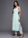 Varanga light blue spaghetti strap kurta with bottom and dupatta.