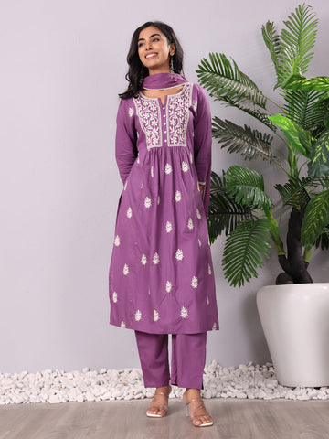 Purple Floral Thread Embroidered A-Line Kurta With Trousers And Dupatta. 