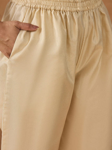 Shimmer Kurta with gold thread embroidery on neck paird with trousers and lurex dupatta