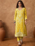Kurta with thread embroidery paired with trousers with embroidered hem and booti embroidered dupatta