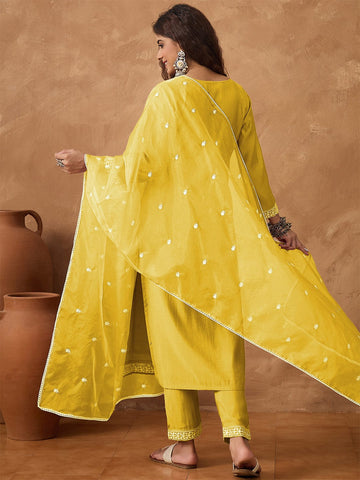 Kurta with thread embroidery paired with trousers with embroidered hem and booti embroidered dupatta