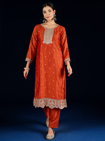 Varanga Graceful Rust 3-Piece Set Featuring A Zari-Embroidered Kurta, Solid Ankle-Length Trousers, And An Elegant Embroidered Dupatta.