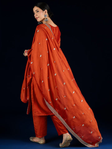 Varanga Graceful Rust 3-Piece Set Featuring A Zari-Embroidered Kurta, Solid Ankle-Length Trousers, And An Elegant Embroidered Dupatta.