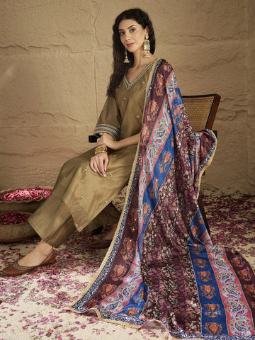 Varanga Women Radiate Festive Charm In This Gold Shimmer Kurta Set With Intricate Lace Detailing, Solid Ankle-Length Trousers, And  Printed Dupatta.