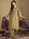 Varanga Women Radiate Festive Charm In This Gold Shimmer Kurta Set With Intricate Lace Detailing, Solid Ankle-Length Trousers, And  Printed Dupatta.