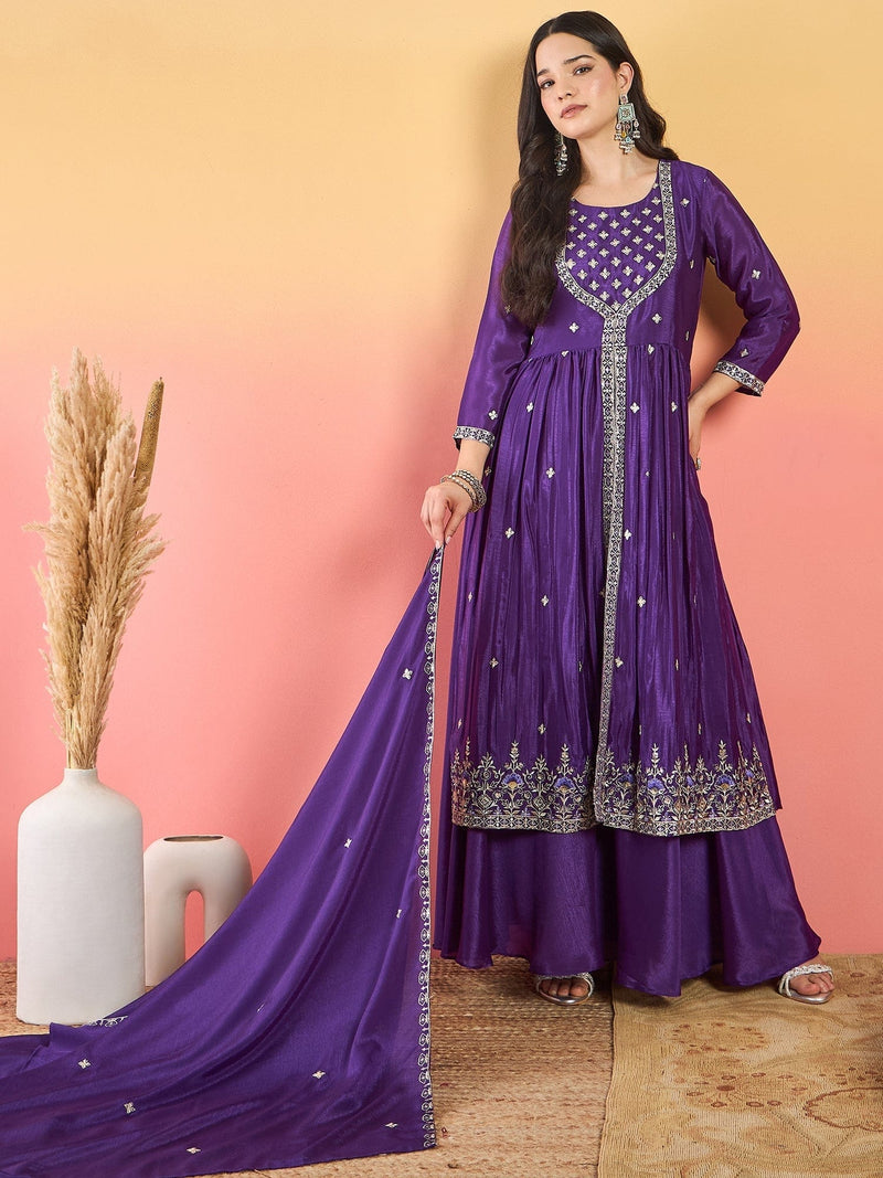 Varanga Anarkali Set Featuring Front-Slit Kurta With Zari-Embroidered Yoke And Border, Paired With A Floor-Length Sharara And A Bordered Dupatta.