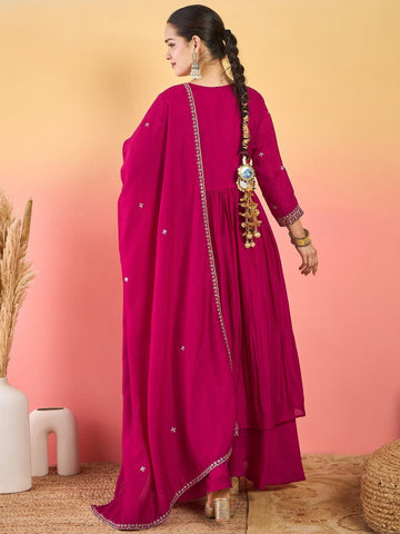 Varanga Fuchsia Anarkali Set Featuring Front-Slit Kurta With Zari-Embroidered Yoke And Border, Paired With A Floor-Length Sharara And A Bordered Dupatta.