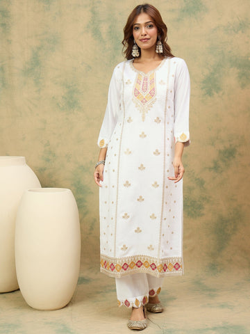 varanga Women Elegant White Ethnic 3-Piece Suit Set With Woven Kurta, Straight Pants, And A Rich Brocade Dupatta.