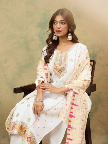 varanga Women Elegant White Ethnic 3-Piece Suit Set With Woven Kurta, Straight Pants, And A Rich Brocade Dupatta.