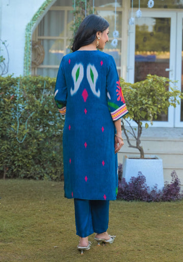 Varanga Women's This eye-catching Straight Kurta Set is crafted from Modal silk. It showcases a beautiful blue placement print and is detailed with exquisite placement hand embroidery. Comes with a matching printed dupatta.
