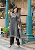 The Varanga Straight Kurta Set is a fusion of comfort and distinctive design. Made from smooth Modal silk, it features a bold black placement print and intricate placement hand embroidery