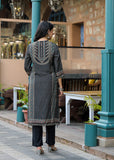 The Varanga Straight Kurta Set is a fusion of comfort and distinctive design. Made from smooth Modal silk, it features a bold black placement print and intricate placement hand embroidery