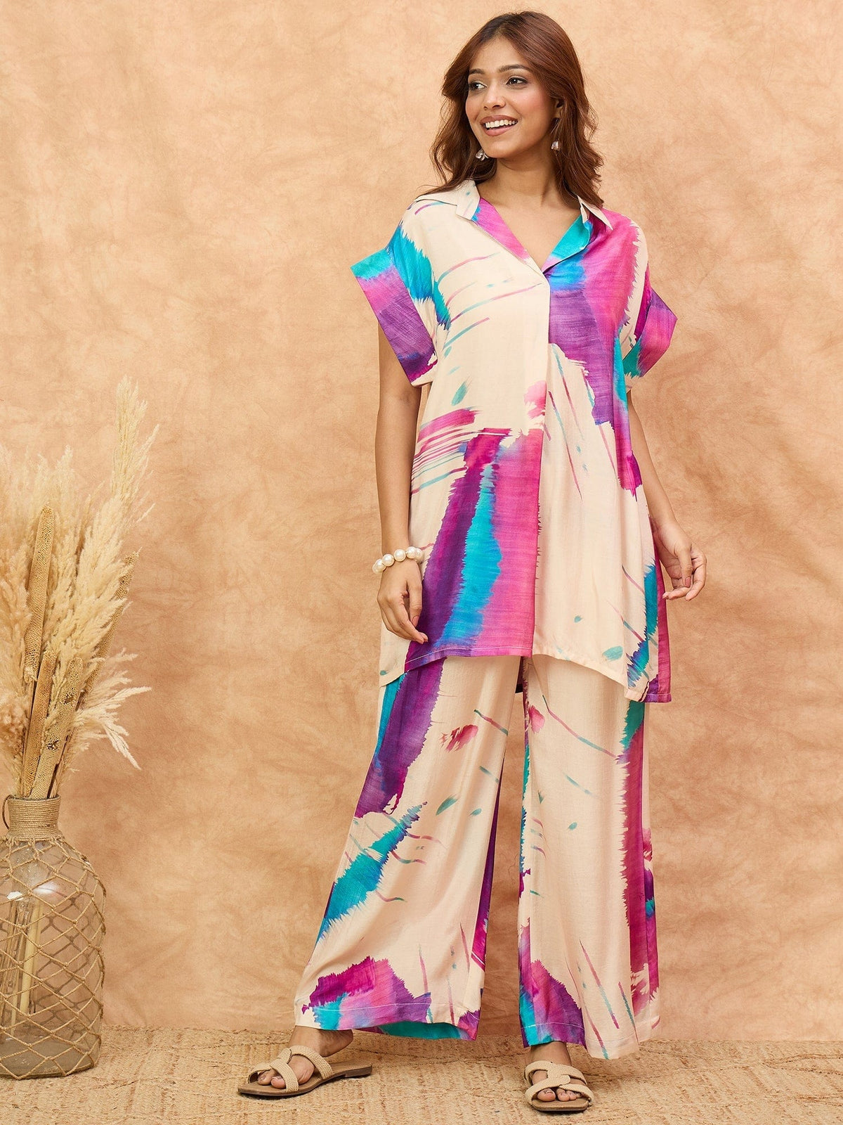 Abstract printed loose fit top with flared palazzo