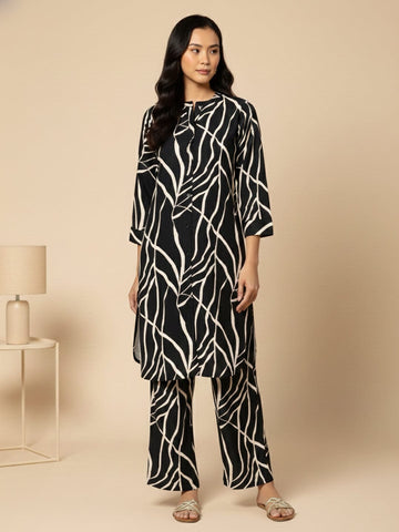 KSUT Women Black & White Abstract Printed Straight Kurta Paired With Tonal Printed Bottom