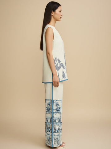 Off-white printed co-ord set featuring a sleeveless V-neck top and relaxed palazzo trousers for a chic, casual look.