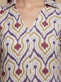 KSUT Women Off White Ikat Printed Shirt Collar Straight Kurta  Paired With Violet Solid Bottom.