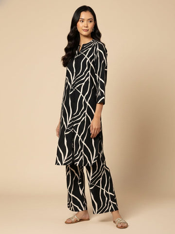 KSUT Women Black & White Abstract Printed Straight Kurta Paired With Tonal Printed Bottom