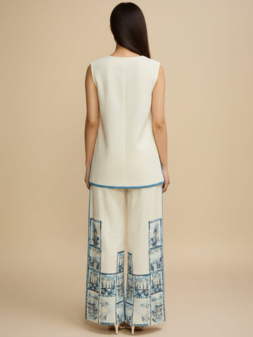 Off-white printed co-ord set featuring a sleeveless V-neck top and relaxed palazzo trousers for a chic, casual look.