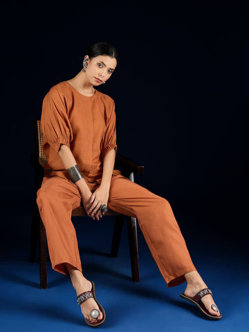 Varanga Rust Straight-Fit Shirt With Puff Sleeves And A Round Neck, Paired With Solid Ankle-Length Straight-Fit Trousers.