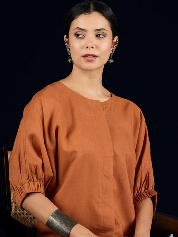 Varanga Rust Straight-Fit Shirt With Puff Sleeves And A Round Neck, Paired With Solid Ankle-Length Straight-Fit Trousers.