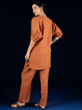 Varanga Rust Straight-Fit Shirt With Puff Sleeves And A Round Neck, Paired With Solid Ankle-Length Straight-Fit Trousers.