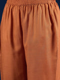 Varanga Rust Straight-Fit Shirt With Puff Sleeves And A Round Neck, Paired With Solid Ankle-Length Straight-Fit Trousers.